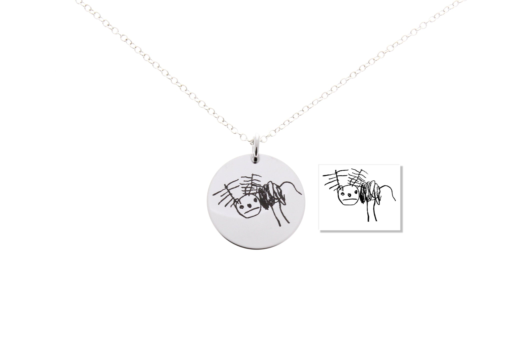kids drawings engraved onto necklace
